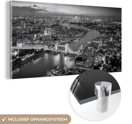 MuchoWow® Glasschilderij 120x60 cm - Schilderij acrylglas - Een skyline van Londen in de ochtendgloren - zwart wit - Foto op glas - Schilderijen