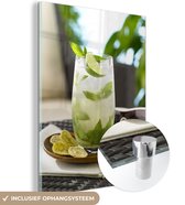 MuchoWow® Glasschilderij 60x80 cm - Schilderij acrylglas - Mojito cocktail in de woonkamer - Foto op glas - Schilderijen