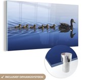 MuchoWow® Glasschilderij 40x20 cm - Schilderij acrylglas - Eend - Jongen - Water - Foto op glas - Schilderijen