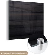 MuchoWow® Glasschilderij 50x50 cm - Schilderij acrylglas - Zwarte achtergrond met een planken structuur - Foto op glas - Schilderijen
