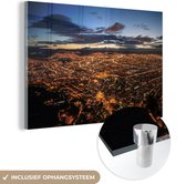 MuchoWow® Glasschilderij 90x60 cm - Schilderij acrylglas - Een kleurrijke zonsopkomst boven Bogota in Colombia - Foto op glas - Schilderijen