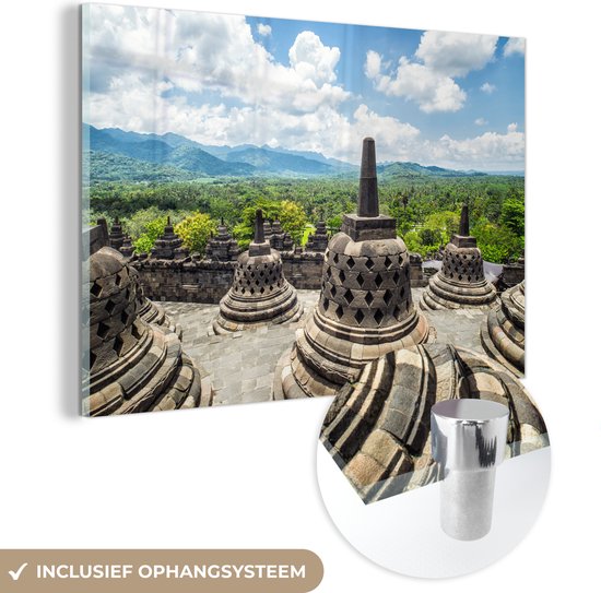Glasschilderij - Witte wolken boven de Borobudur tempel - Acrylglas Schilderijen - Foto op Glas