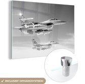 MuchoWow® Glasschilderij 90x60 cm - Schilderij acrylglas - Twee vliegende militaire vliegtuigen - zwart wit - Foto op glas - Schilderijen