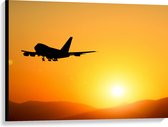Canvas - Silhouet van Passagiers Vliegtuig Wegvliegend van Zonsondergang - 100x75 cm Foto op Canvas Schilderij (Wanddecoratie op Canvas)