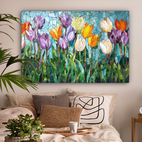 Mozaïek van kleurrijke tulpen in een slaapkamer boven een bed met kussens.