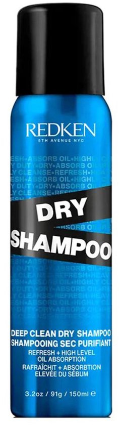Blauwe spuitbus Redken Dry Shampoo met zwarte dop. Tekst op de bus is wit en grijs.