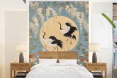 Behang - Fotobehang Kraanvogels - Maan - Bloemen - Blauw - Breedte 160 cm x hoogte 220 cm