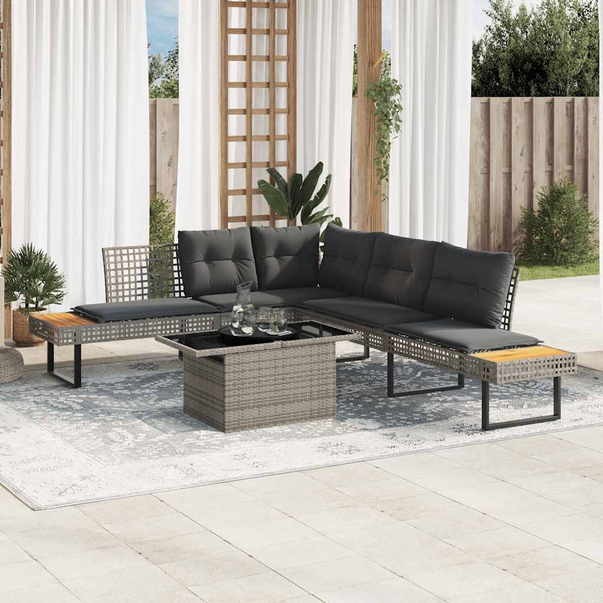 Grijze poly rattan loungeset met kussens en glazen tafel - Buitendecoratie.