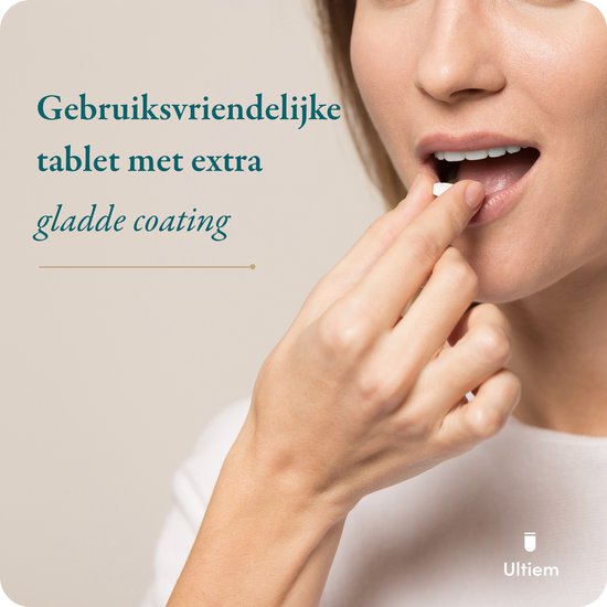 Vrouw neemt een tablet met gladde coating.