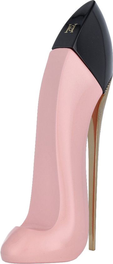 Roze pumpvormige parfumfles met zwarte hak en gouden details.