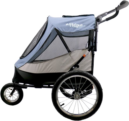 Zij-aanzicht van een blauwe hondenbuggy met grote wielen en een voorwiel.
