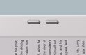 Close-up van de twee bladerknoppen op een witte e-reader.