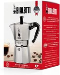 Zilverkleurige Bialetti Moka Express percolator (9 koppen) in verpakking met koffiebonen.