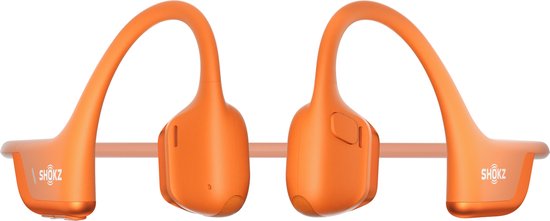 Oranje Shokz OpenRun Pro 2 koptelefoon, met de oplaadpoort zichtbaar.
