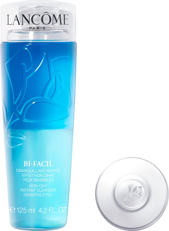 Lancôme Bi-Facil oogmake-up remover in een transparante fles met blauwe vloeistof, met dop ernaast.