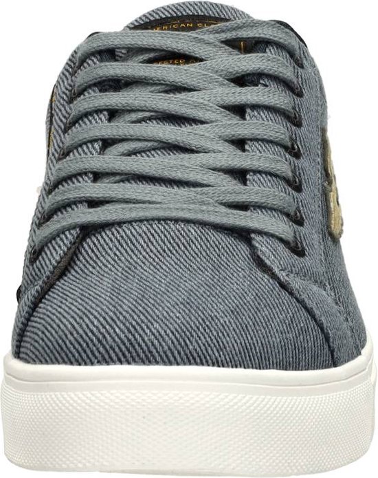Avant d'une sneaker PME Legend bleu en denim avec semelle blanche.