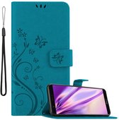 Cadorabo Hoesje voor Huawei P SMART 2018 / Enjoy 7S in BLOEMEN BLAUW - Beschermhoes in bloemmotief met magnetische sluiting, standfunctie en kaartsleuven Book Case Cover Etui