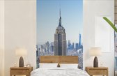 Behang - Fotobehang Skyline van New York met het Empire State Building - Breedte 120 cm x hoogte 240 cm