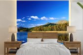 Behang - Fotobehang Weerspiegeling van de bergen over het meer van Loch Lomond in Schotland - Breedte 240 cm x hoogte 240 cm