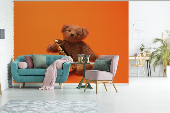 Papier fotobehang Ours en peluche avec un saxophone