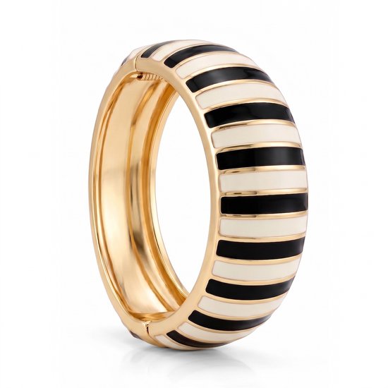 Goudkleurige scharnierarmband met crème en zwarte strepen.