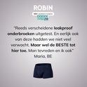 Foto van een marineblauwe Robin boxer. Tekst: 'Reeds verscheidene leakproof onderbroeken uitgetest... MAAR wel de BESTE tot hier toe'.