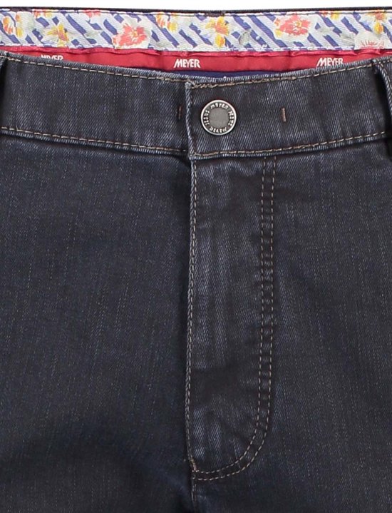 Donkerblauwe Meyer jeans met rood-wit gestreepte en bloemenprint binnenzijde van de tailleband.