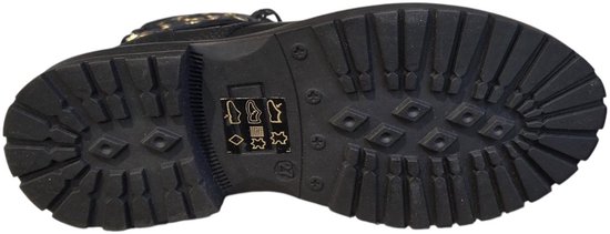 Zwarte profielzool van rubber onder een Develab schoen, maat 27.