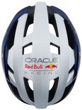 Bovenaanzicht van witte helm met Red Bull Racing logo, blauwe en zwarte details op de zijkanten.