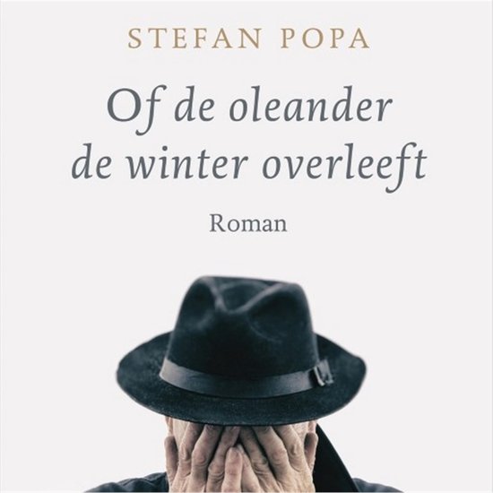 Boek "Of de oleander de winter overleeft" door Stefan Popa, met een man die zijn gezicht bedekt met zijn handen onder een zwarte hoed.