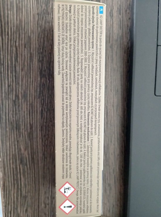 K2 Lamp Doctor doos met gebruiksaanwijzing in het Pools. De tekst beschrijft de renovatie van koplampen.
