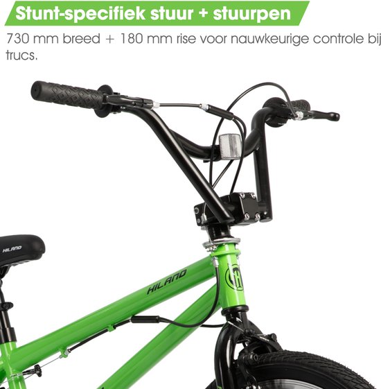 Close-up van de groene kinder BMX fiets: zwart stuntstuur met 730 mm breedte en 180 mm rise.