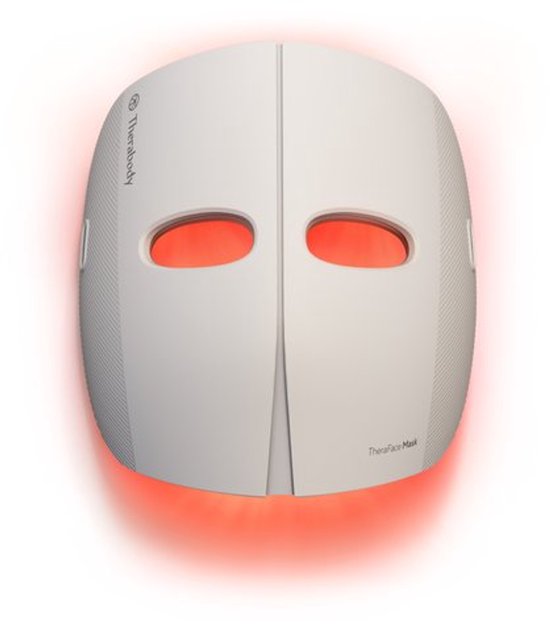 Wit TheraFace Mask met rode LED-verlichting aan de binnenkant, op een witte achtergrond.