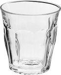 Verre à eau vide, transparent et côtelé.