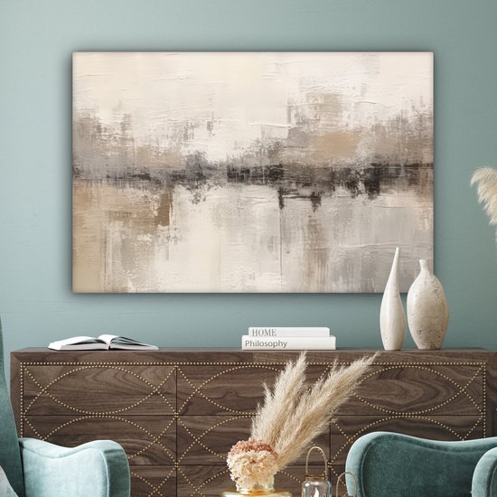 Peinture abstraite dans des tons beige, gris et brun sur un mur au-dessus d'un buffet.