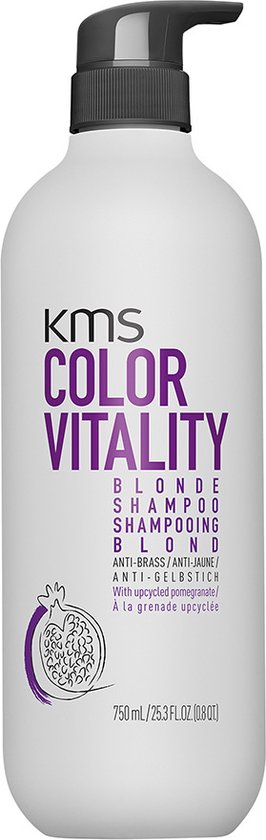 Witte fles KMS Color Vitality Blonde Shampoo met zwarte pomp en granaatappel illustratie.