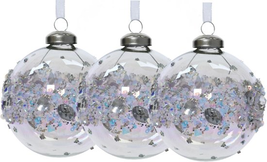 Trois boules de Noël transparentes nacrées, décorées de paillettes et de strass.