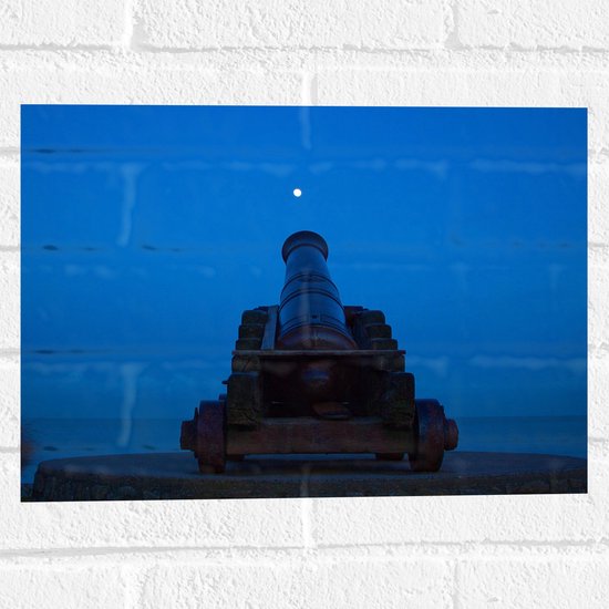 WallClassics - Muursticker - Kanon bij Blauwe Lucht - 40x30 cm Foto op Muursticker