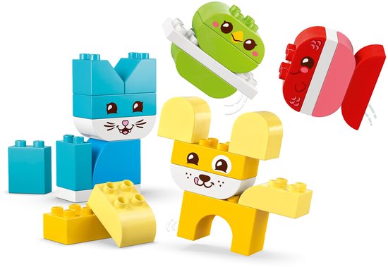 Vier DUPLO-figuren: blauwe kat, gele muis, groene vogel en rode vis.
