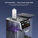 Gedetailleerde opname van een waterdispenser met ingeschakeld UV-licht dat paars gloeit in de tank. Tekst "UV Protection — Stay Fresh, Stay Safe".
