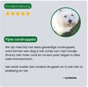 Klantenrecensie met 5 sterren voor fijne oordruppels van TraumaPet, met foto van een witte West Highland Terrier.