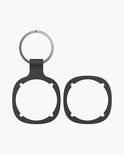 Zwart sleutelring accessoire met een ronde uitsparing en een extra ring.