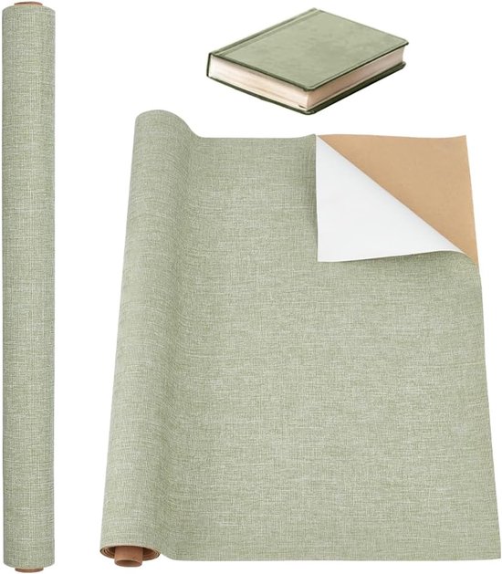 Rol groen zelfklevend linnen kaftpapier met een opengeslagen stuk dat de witte papieren beschermlaag toont.