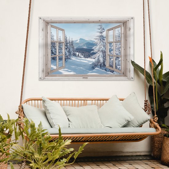 Poster de jardin avec fenêtre ouverte sur paysage de montagne enneigé, accroché à un mur clair.