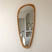 Miroir mural ovale Glam de 860 mm avec feuilles de ginkgo creuses dans un cadre en métal doré pour chambre à coucher｜Homary