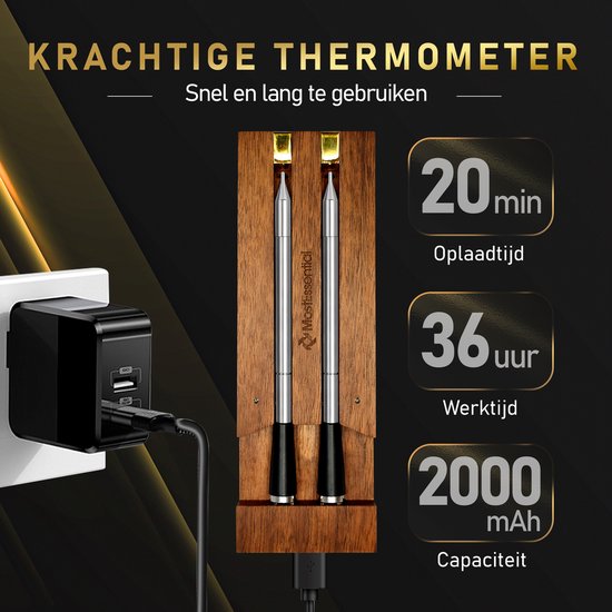Twee zilverkleurige vleesthermometers in een houten kistje, opgeladen via een witte adapter.