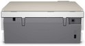 Achterkant van een witte HP Envy Inspire 7220e printer met grijze details en aansluitingen.