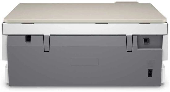 Achterkant van een witte HP Envy Inspire 7220e printer met grijze details en aansluitingen.