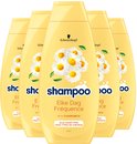Cinq bouteilles de shampooing jaune avec des fleurs de camomille, "Schwarzkopf shampooing Chaque Jour Fréquence à la camomille"