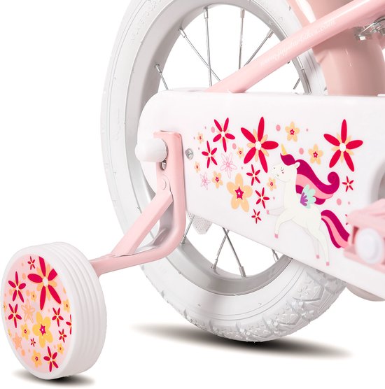 Roze frame van een kinderfiets met een witte band, zijwieltjes en een decoratie van een eenhoorn en bloemen.